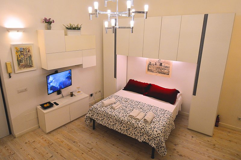 The sleeping area of Rome's stylish Tiber Apartment.