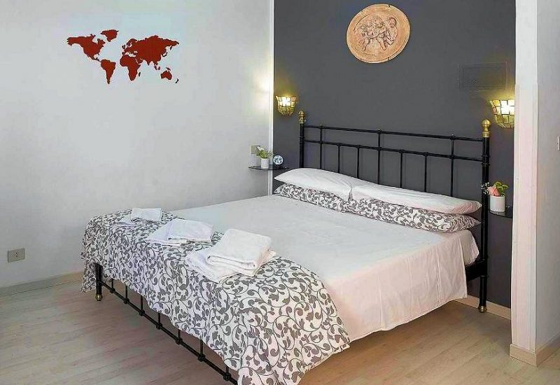 The Vatican Apartment's large double bed.