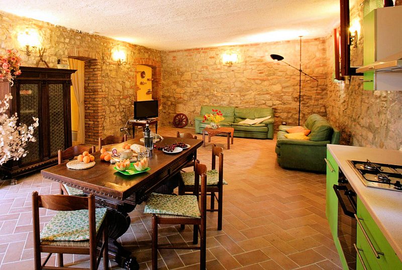 Kitchen, dining, and living are open-plan at Apartment B.