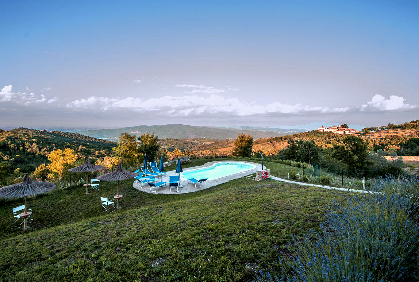 The inviting pool set among the hills of Tuscany