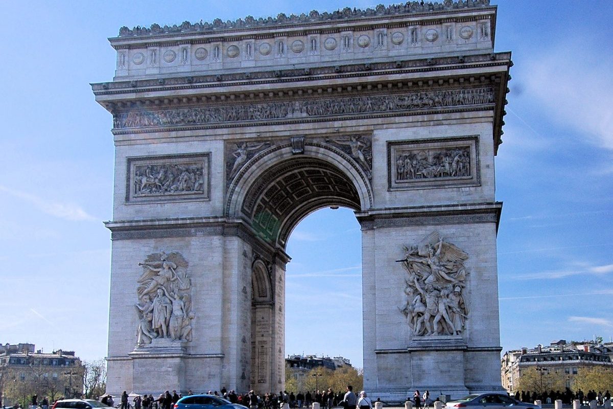 The Neoclassical Arc de Triomphe honors France's war dead from the French Revolution, the Napoleonic Wars, and World War I.