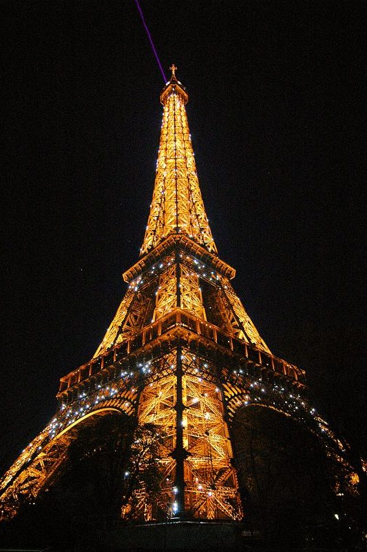 At night the Eiffel Tower is alight with thousands of dancing lights.