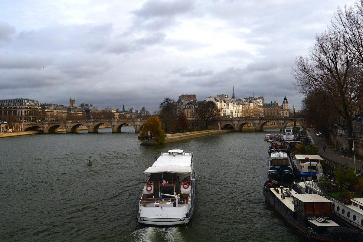 The cultural and patriotic center of France — Île de la Cité — off the port bow.