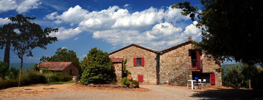 Converted Tuscan farm buildings are now comfortable Alta Maremma estate cottages in rural Tuscany.