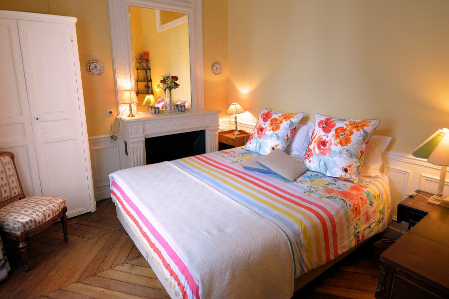 An ultra-comfortable memory foam queen bed is the centerpiece of the double bedroom.