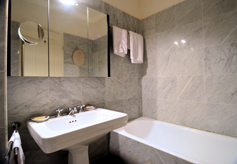 There are two bathrooms at the Place des Galeries apartment, Bathroom 1 (with bathtub) and Bathroom 2 (with shower).