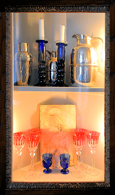 Detail of one of the four dining room china cabinets at the Place des Galeries apartment.