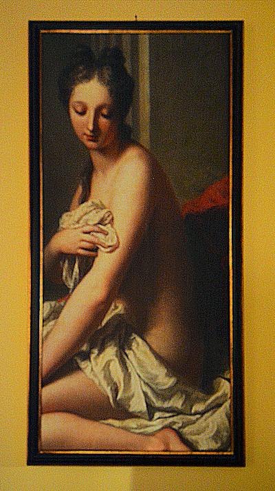 The French love art. This apartment is decorated with paintings, drawings, and prints.