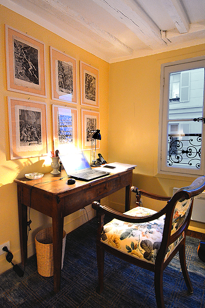 Quality furnishings punctuate the apartments classic elegance.