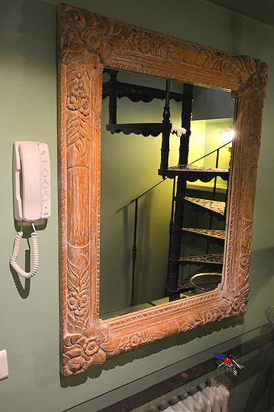 Entry Hall with entry phone and mirror.