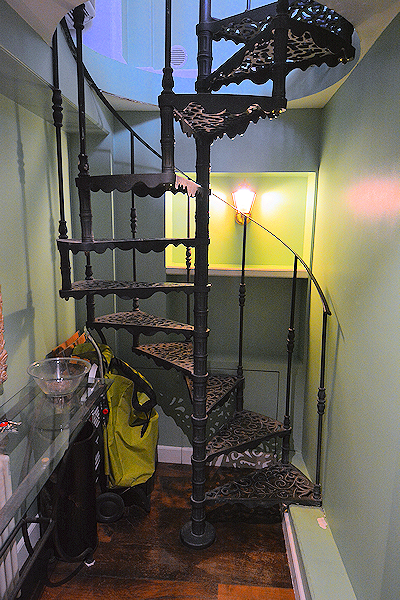 Careful! These tightly-wound, iron stairs are not right for everyone.