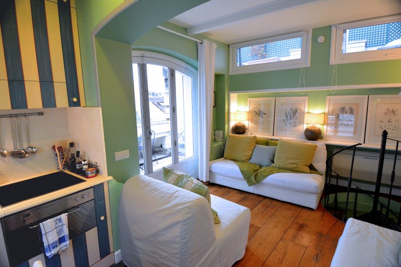 Note the French doors leading to the upper floor terrace.