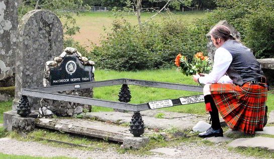 Paying homage to Rob Roy at Balquhidder Kirk.