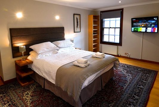 Edinburgh - Lodging - Heathers Penthouse Flat - Royal Mile - Master Bedroom - Photo copyright Home At First Edinburgh: Heather's Penthouse Flat — Master King Bedroom