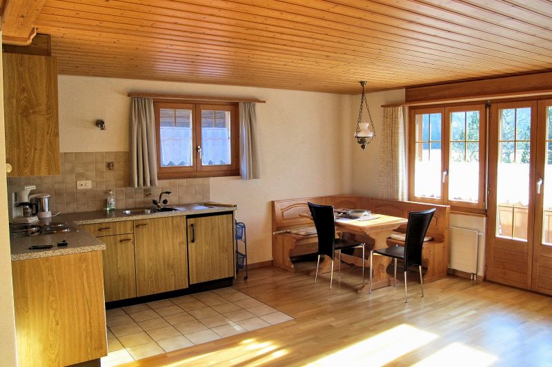 Chalet Balmhorn - 1-bedroom, 2nd floor apt - kitchen, dining room with balcony access