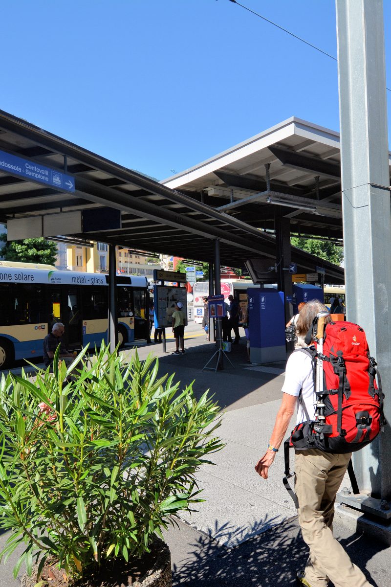 New Town — Hiker arriving at Locarno transport center.