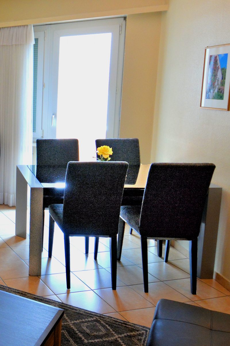 New Town — Standard Apartment — Dining Table with Balcony Access