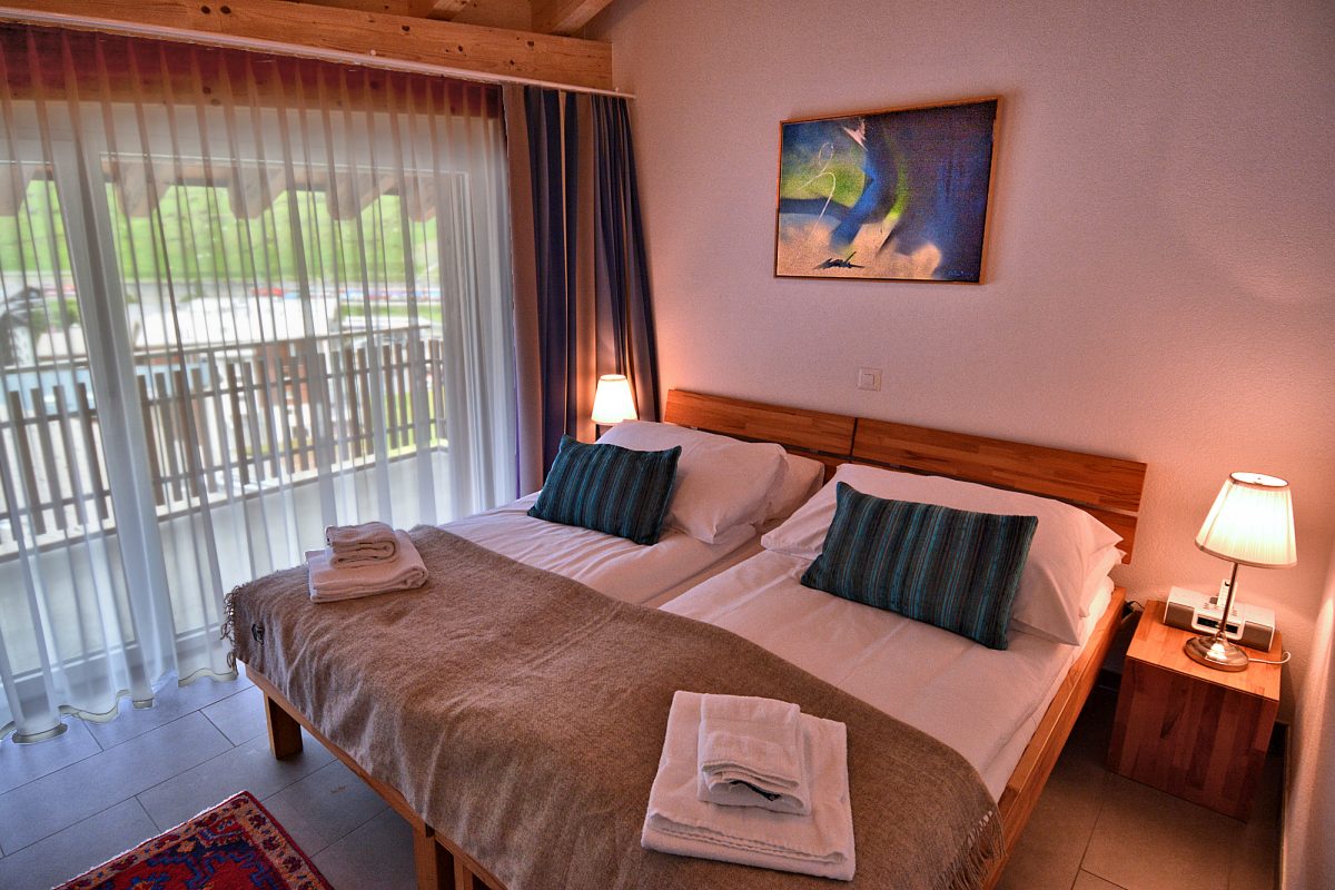 Highview Apt. — Double Bedroom 2 with Balcony View.