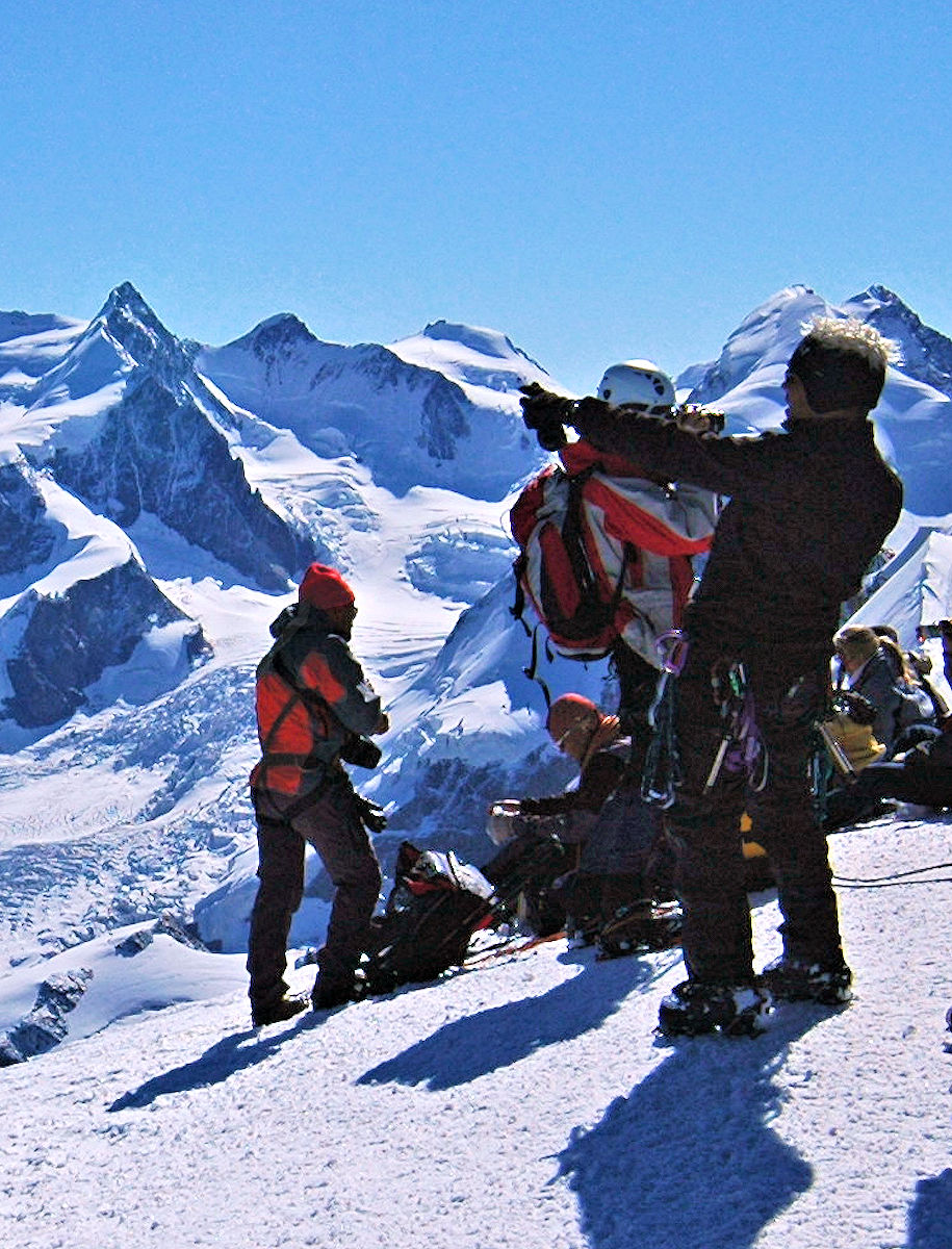 Mountaineers take a break among Switzerland's highest peaks.