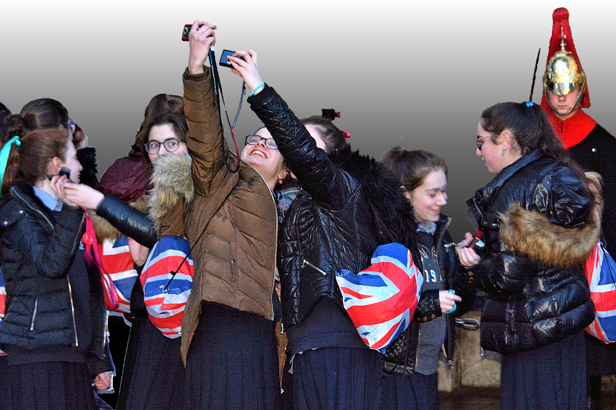 Schoolgirl selfies show there's still magic in all things royal, perhaps especially uniformed guards.