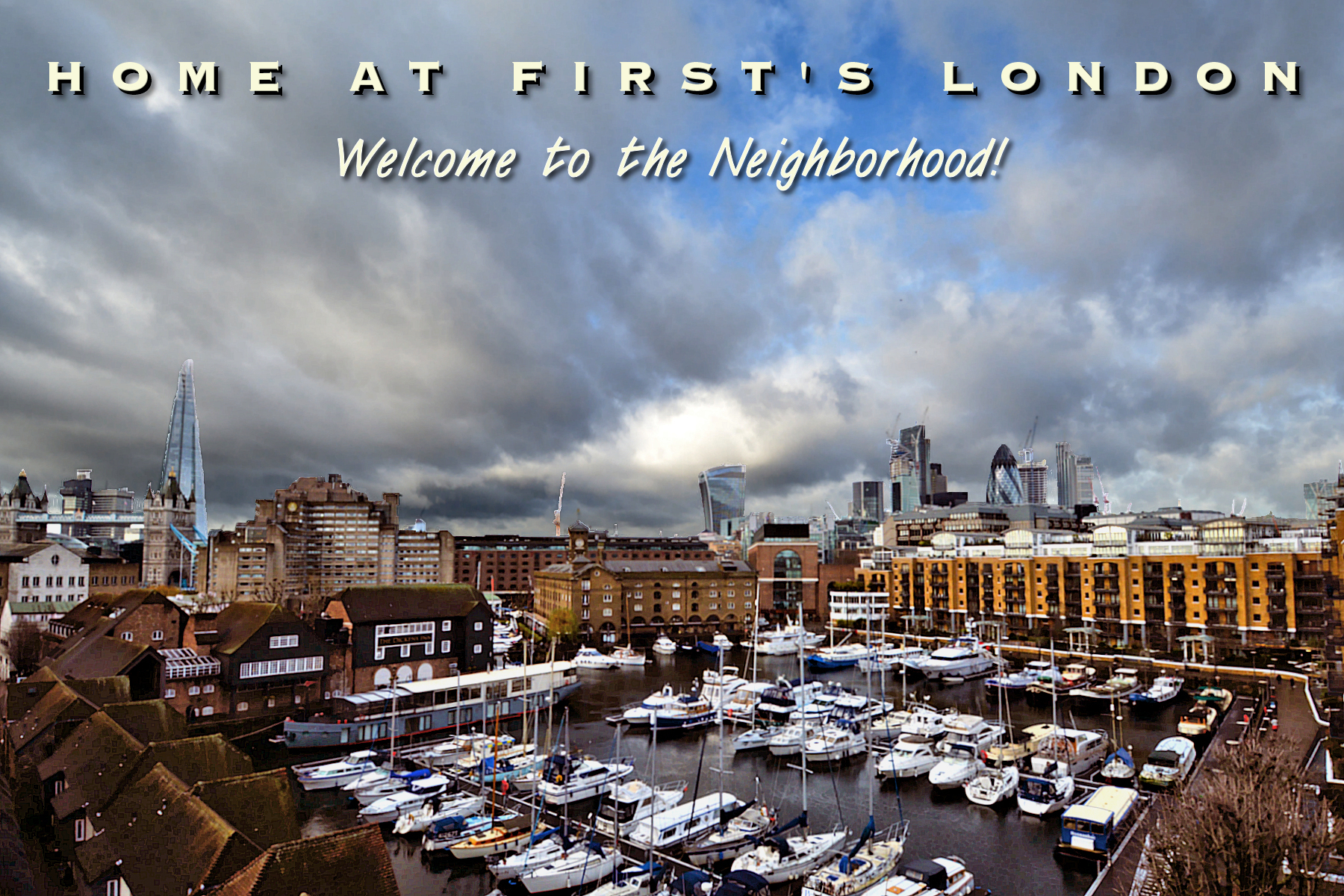 Home At First's London Neighborhood Lodging Locations - St Katharines Marina East Dock with skyscrapers.