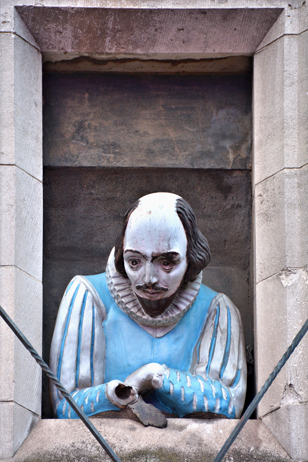 Man about Town: Shakespeare in the open window ponders the crowds on Carnaby Street.