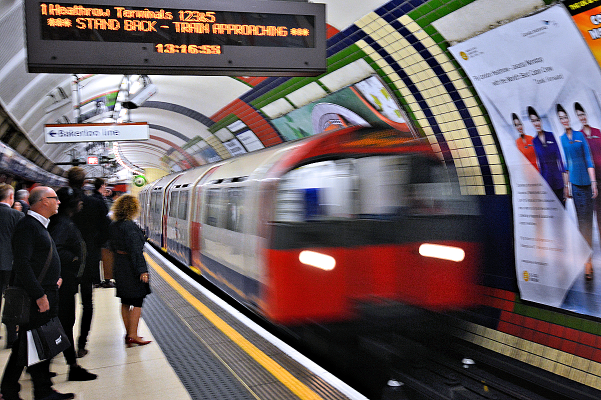"Stand Back Train Approaching." The Tube's 11 lines carry 5 million passengers daily.