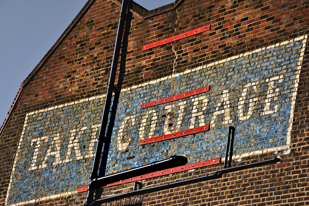 "Take Courage", South Bank. Courage Brewery's old Anchor Brewhouse is on Shad Thames by Tower Bridge.