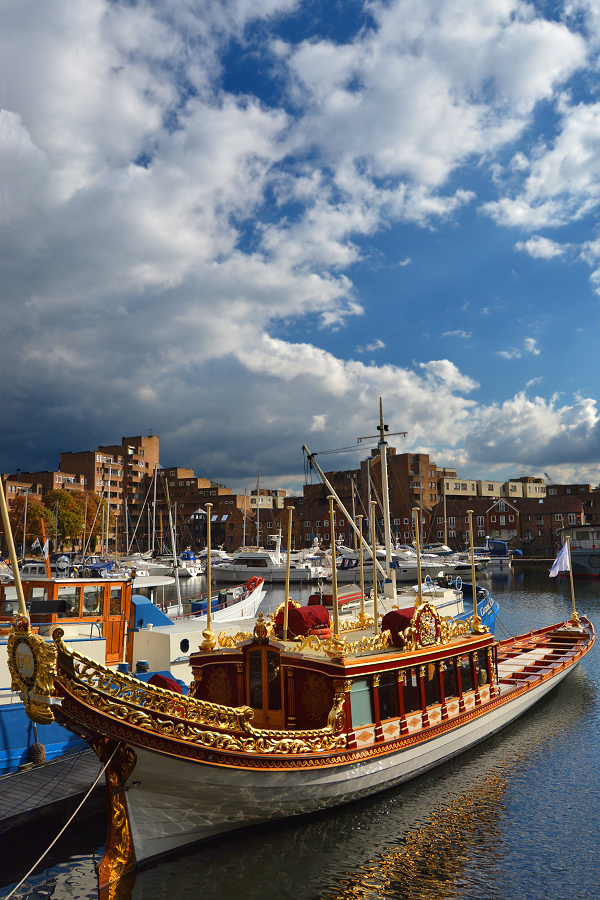 St. Katharine's Marina: the Queens Royal (river) Barge "Gloriana" moored at St. Katharines Docks.