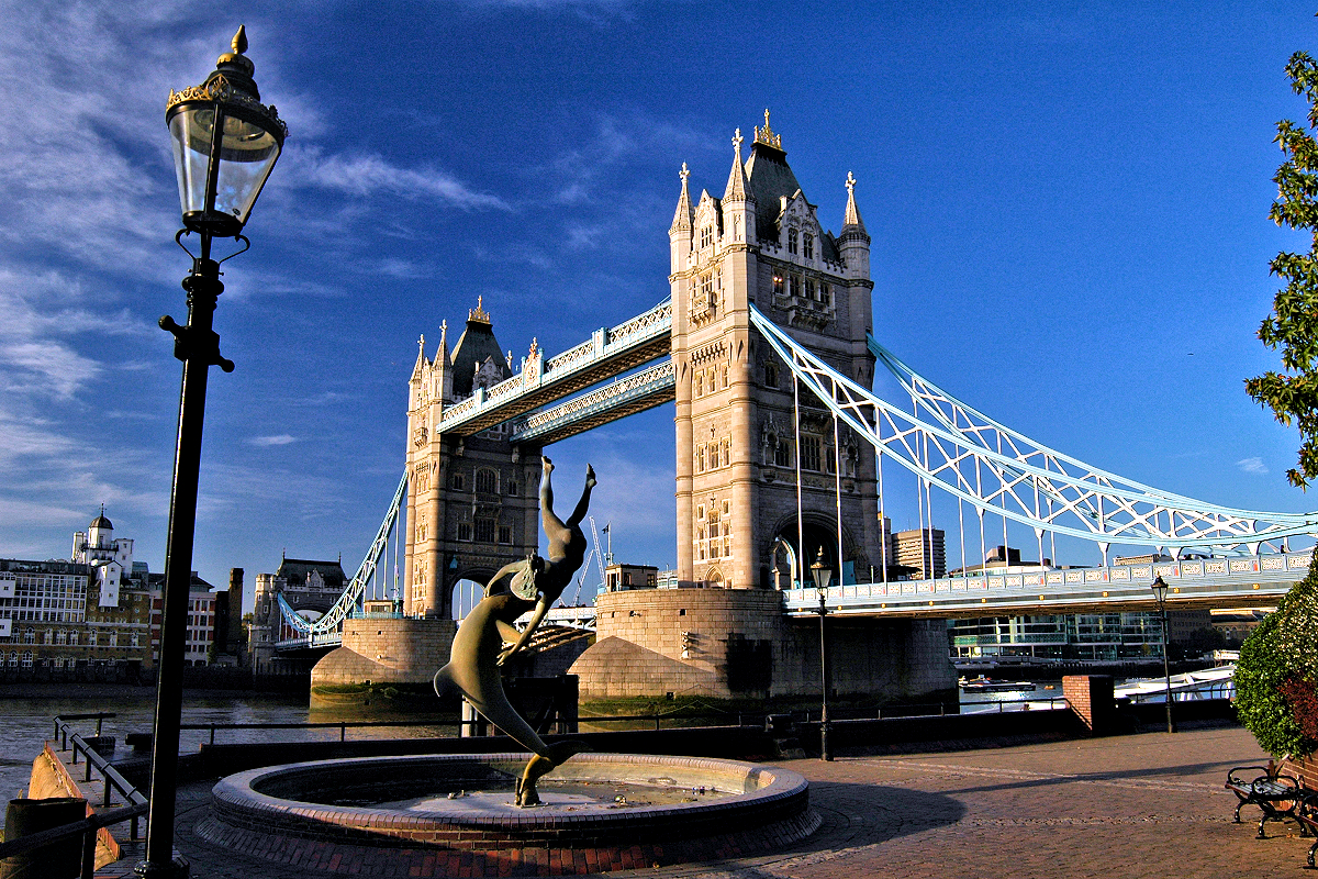 Sunrise on Tower Bridge viewed from St. Katharine's Marina riverside entry.