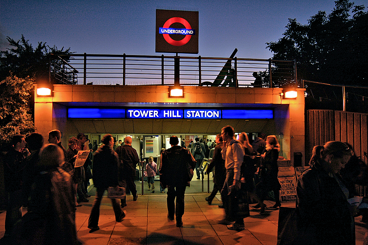 Busy Tower Hill Station at dusk. From here two Underground lines connect with much of central London.