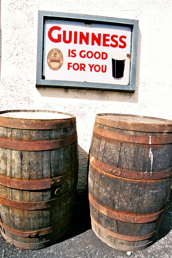 Guinness is good for you - sign and barrels.