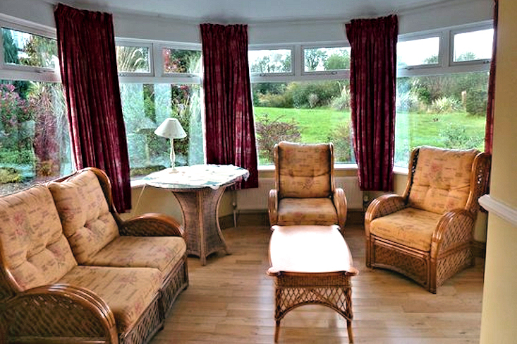 Kenmare Bay Cottage conservatory. Photo courtesy the owners.