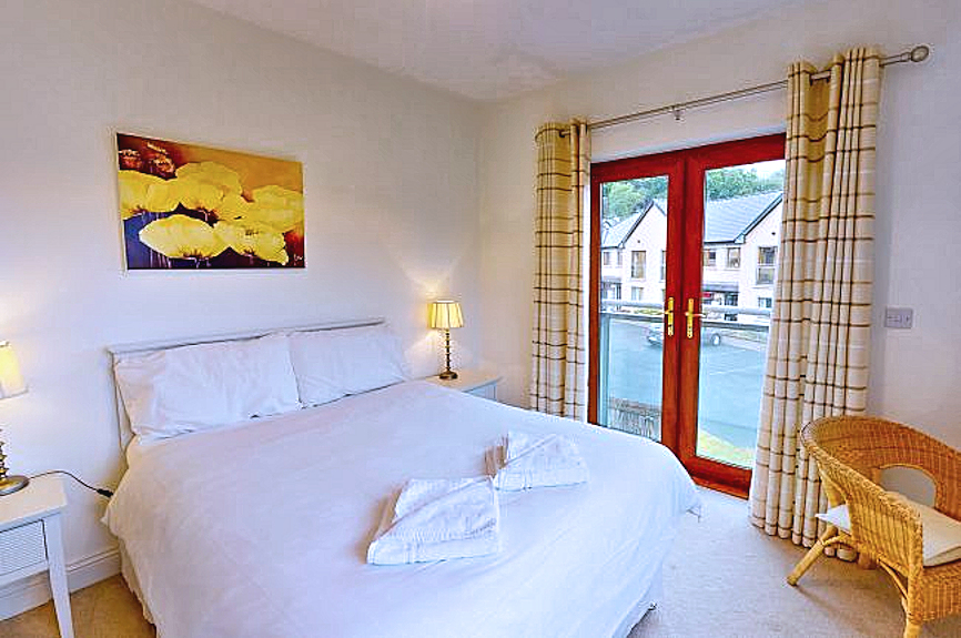 Killaloe Townhouses: double bedroom with balcony. Photo courtesy the owners.