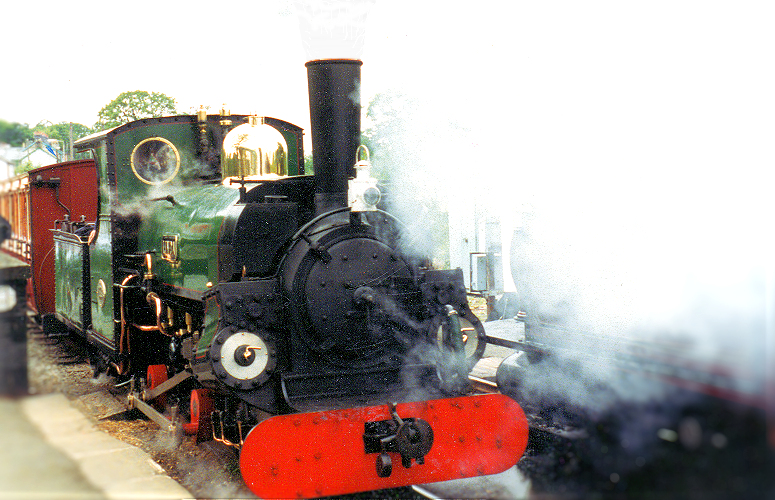 Ffestiniog Steam Train departing Porthmadog for Blaenau Ffestiniog. Photo © Home At First. Ffestiniog Steam Train departing Porthmadog for Blaenau Ffestiniog. Photo © Home At First.