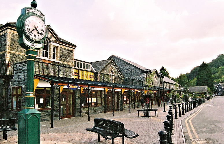 NW Wales: Betws-y-Coed railway station plaza. Photo © Home At First. Betws-y-Coed is a popular town for guests of Home At First's cottage vacations. Wales is Britain's best-kept secret and Betws-y-Coed in Snowdonia is one of its hidden gems! NW Wales: Betws-y-Coed railway station plaza. Photo © Home At First. Betws-y-Coed is a popular town for guests of Home At First's cottage vacations. Wales is Britain's best-kept secret and Betws-y-Coed in Snowdonia is one of its hidden gems!