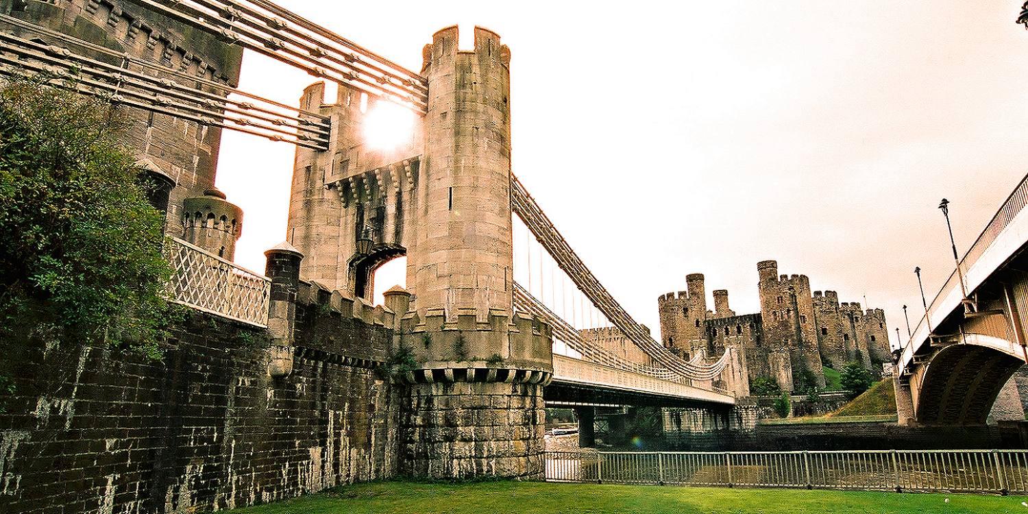 NW Wales: Conwy Castle with old and new road bridges. Photo copyright Home At First. NW Wales: Conwy Castle with old and new road bridges. Photo copyright Home At First.