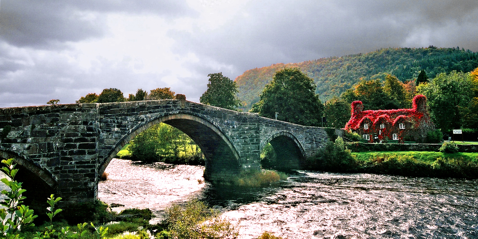 NW Wales: the Pont Fawr bridge across the River Conwy at Llanrwst. Photo copyright Home At First. NW Wales: the Pont Fawr bridge across the River Conwy at Llanrwst. Photo copyright Home At First.
