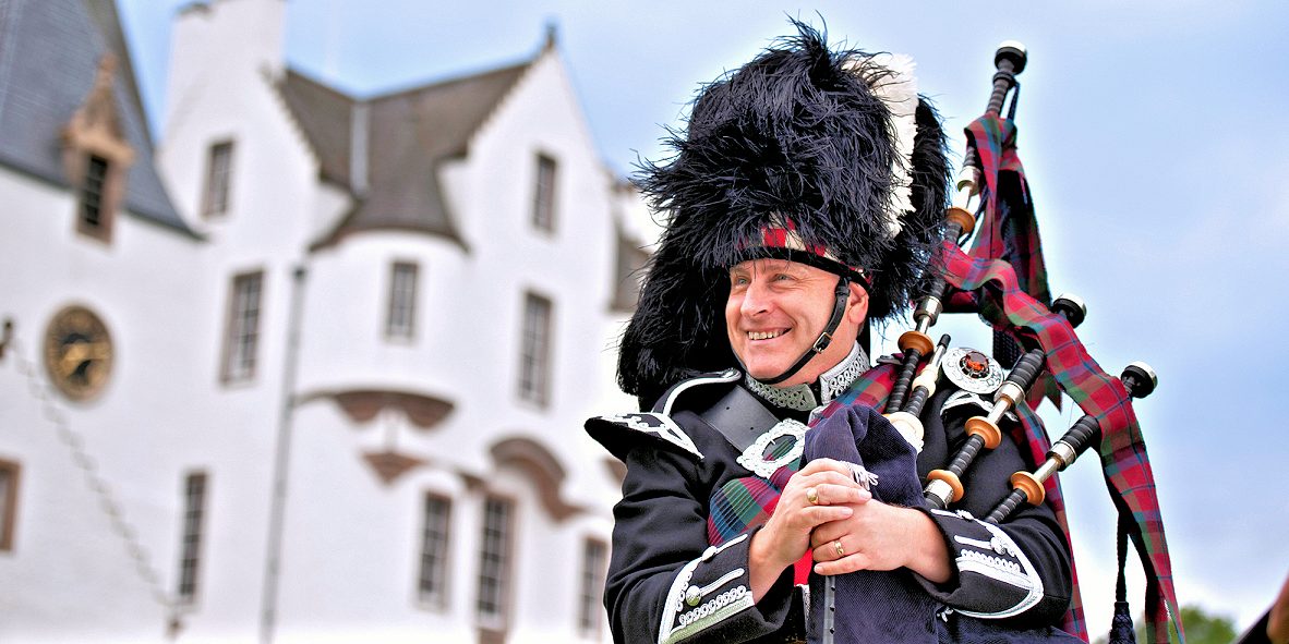 Piper at Blair Castle, ancestral home of Clan Murray and seat of the Duke of Atholl. Melody Thornton Photo © VisitBritain.
