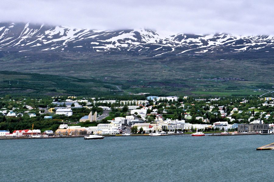Iceland Landscapes: Akureyri panorama from across Eyjafjörður Fjord. Photo © Home At First.