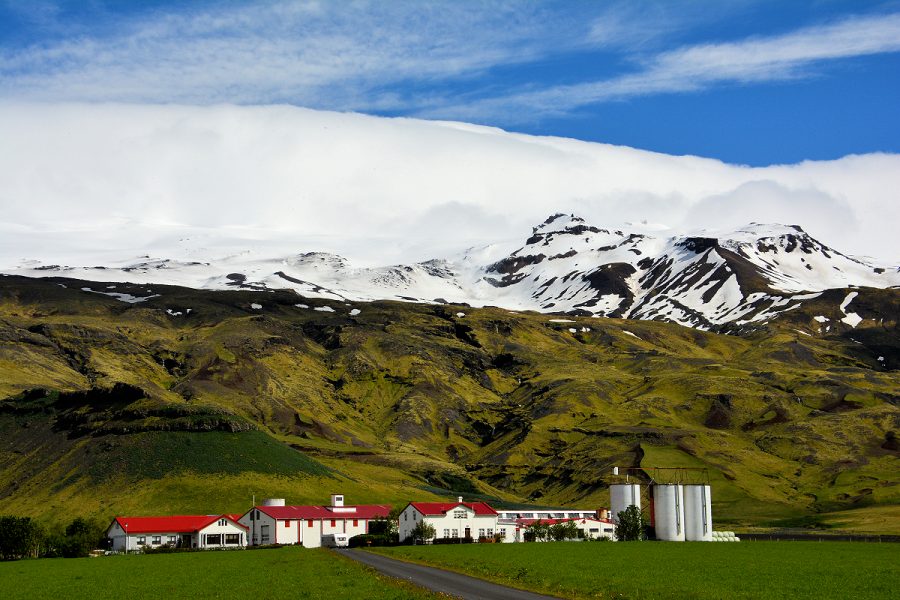 Iceland Landscapes: Farm in the shadow of Eyjafjallajokull volcano - erupted in 2010. Photo © Home At First.