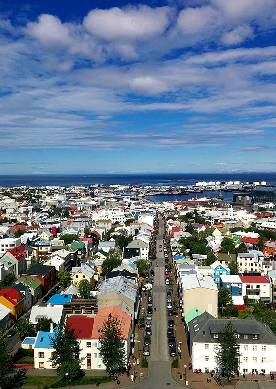 Reykjavik & harbor from Hallgrimskirkja church. John Mraz Photo © Home At First.