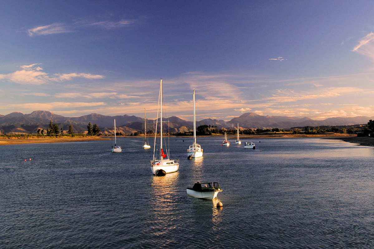 Nelson Region: Tasman Bay - Mapua Inlet with Kahurangi NP mountains. Photo © Home At First.