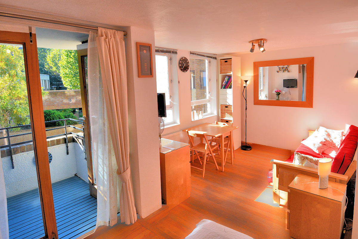 London: St Katharines — Lady Jane Grey Studio Flat - Balcony-Living-Dining. Photo © Home At First.