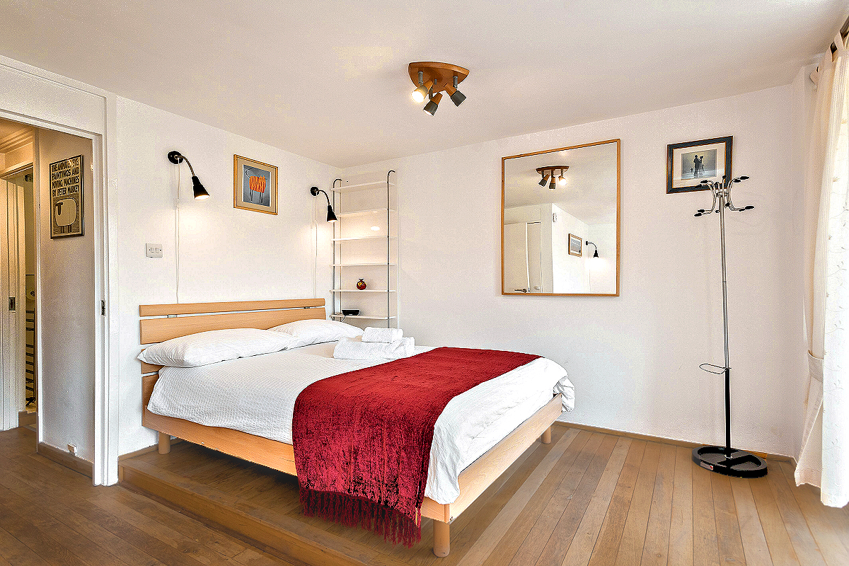 London: St Katharines — Lady Jane Grey Studio Flat - Double Bed Sleeping Area. Photo copyright DB/Home At First.