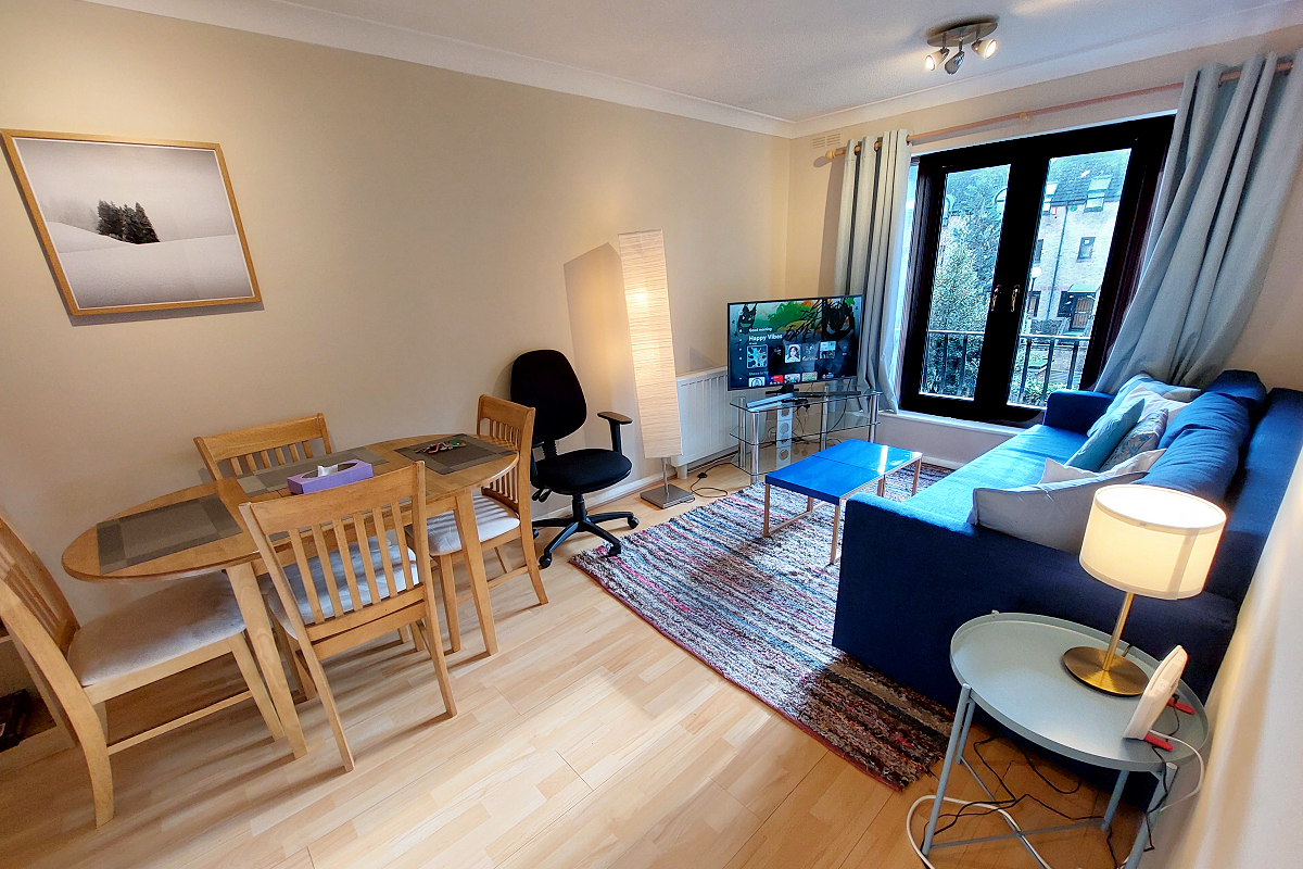 London: Tower Hamlets, Wapping — Docklands New Flat - Living-Dining-Balcony. Photo © Home At First.