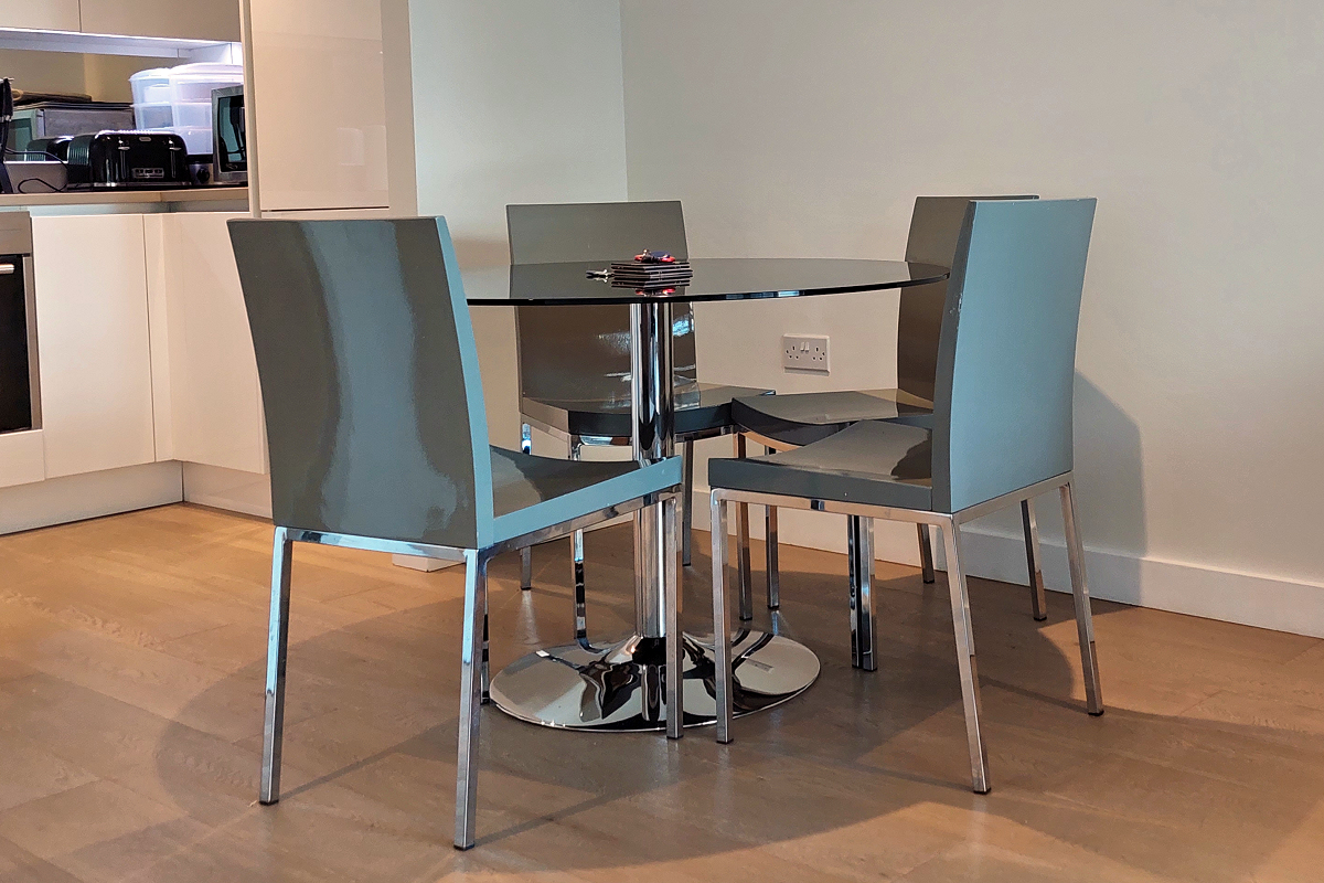 London: Tower Hamlets, Wapping — Tobacco Dock Apartment - Dining Area by the Kitchen. Photo © Home At First.