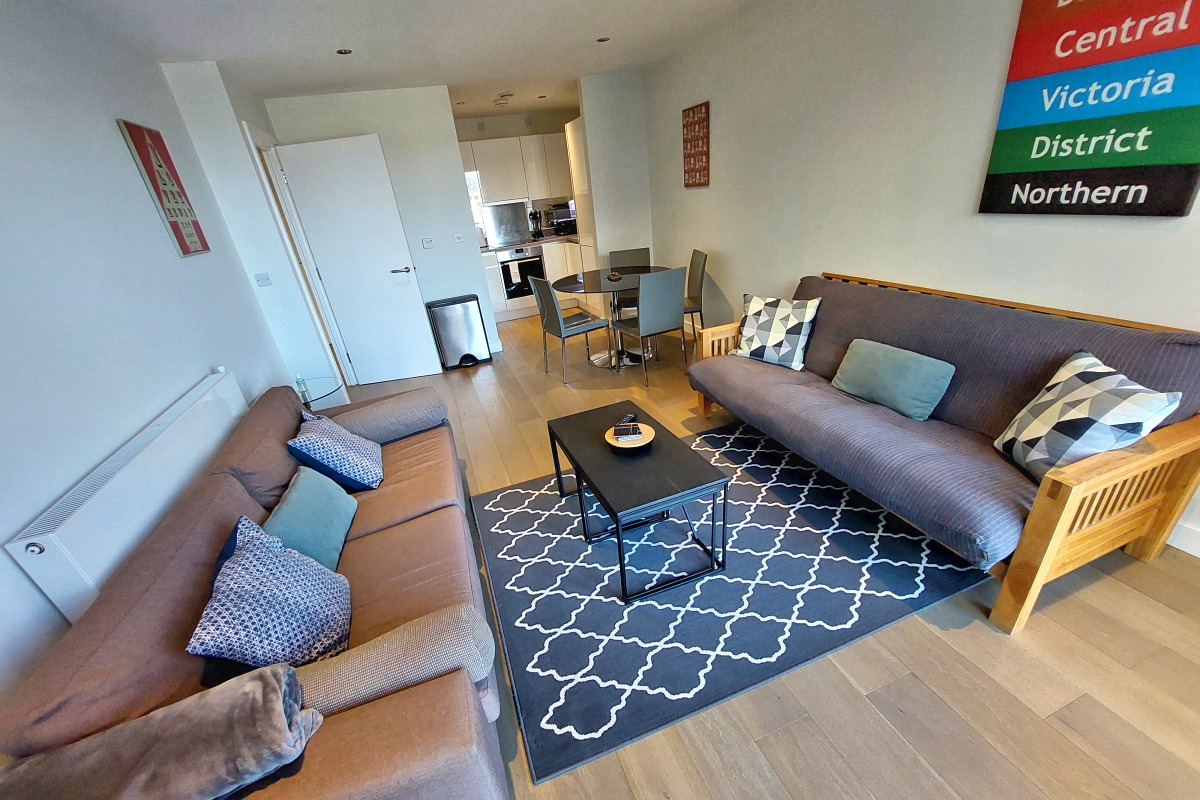 London: Tower Hamlets, Wapping — Tobacco Dock Apartment - Living-Dining-Kitchen. Photo © Home At First.