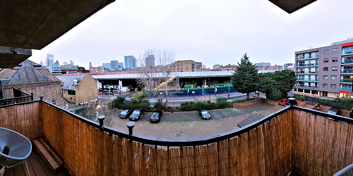 London: Tower Hamlets, Whitechapel — Jack the Ripper Apt. - Balcony with exterior view showing DLR. Photo © Home At First.
