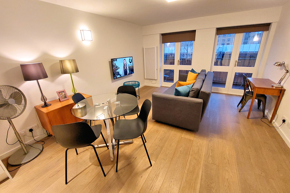 London: Tower Hamlets Whitechapel — Jack the Ripper Apt. - Dining-Living-Balcony. Photo © Home At First.